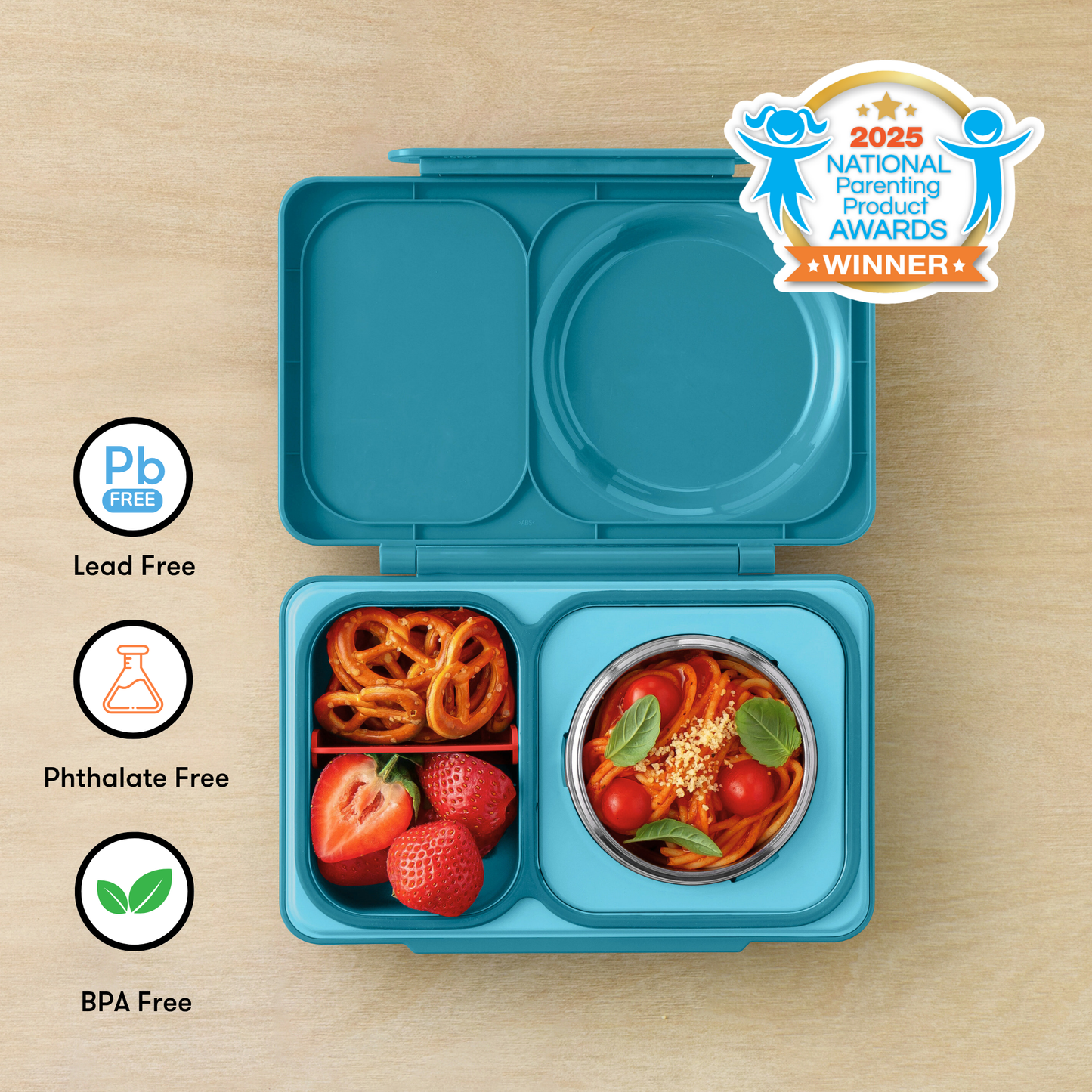 Blue bento box with food compartments on a wooden surface, featuring 'Pb Free', 'Phthalate Free', and 'BPA Free' labels, and a 2025 National Parenting Product Award winner badge.