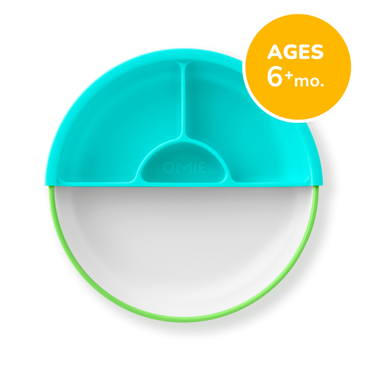 Teal lid with divided sections on a white plate, suitable for babies aged 6 months and older.
