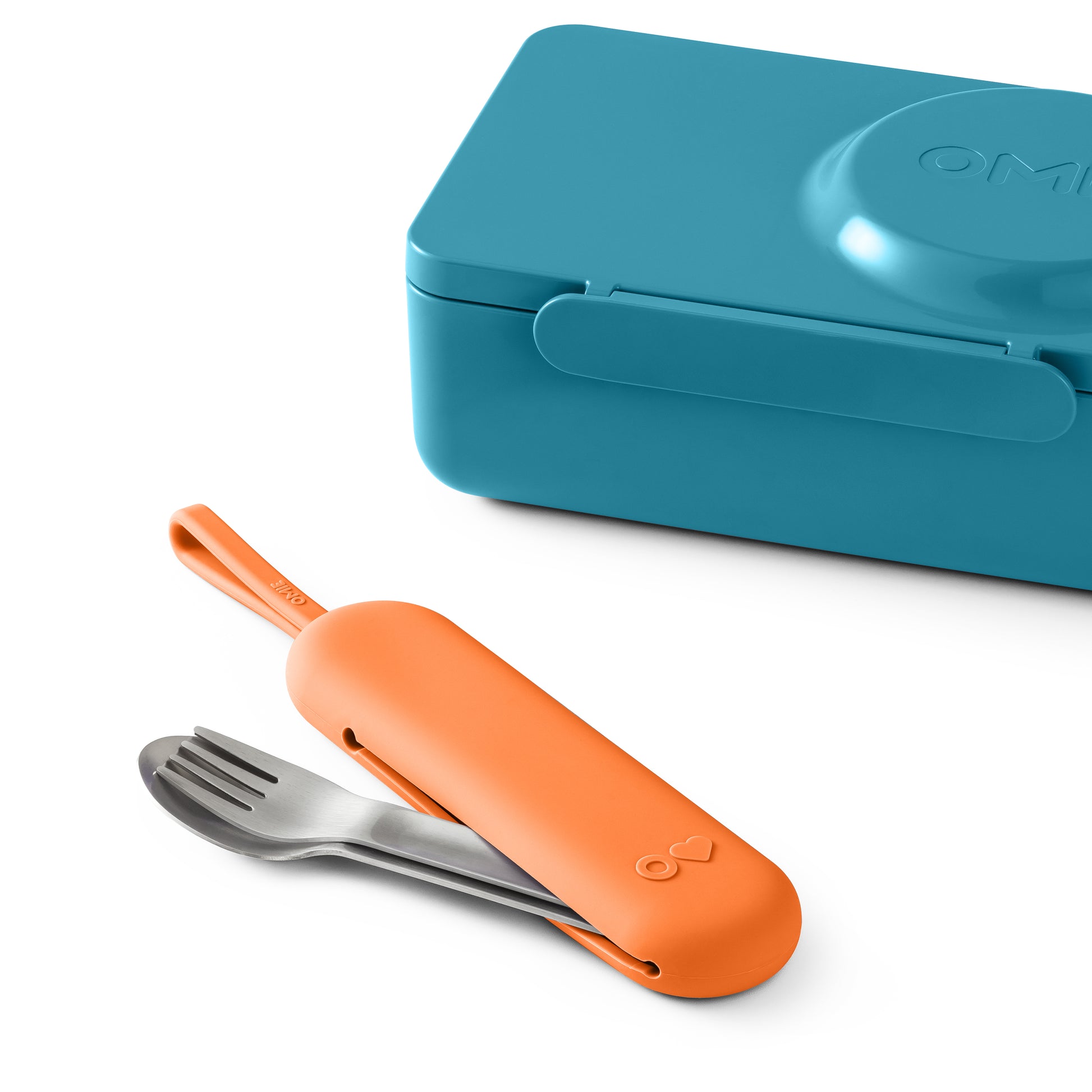 Orange utensil holder with silver fork and blue container on a white background