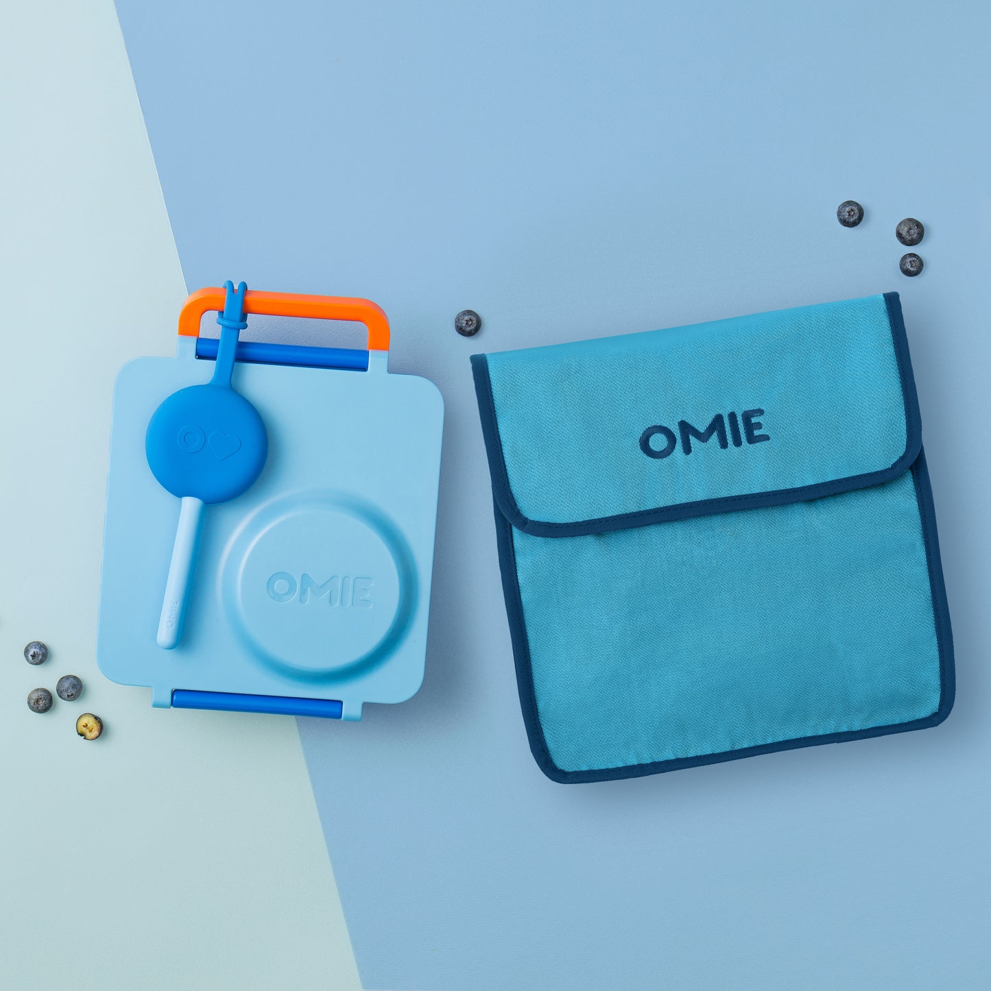 Blue OMIE product set on a light blue background