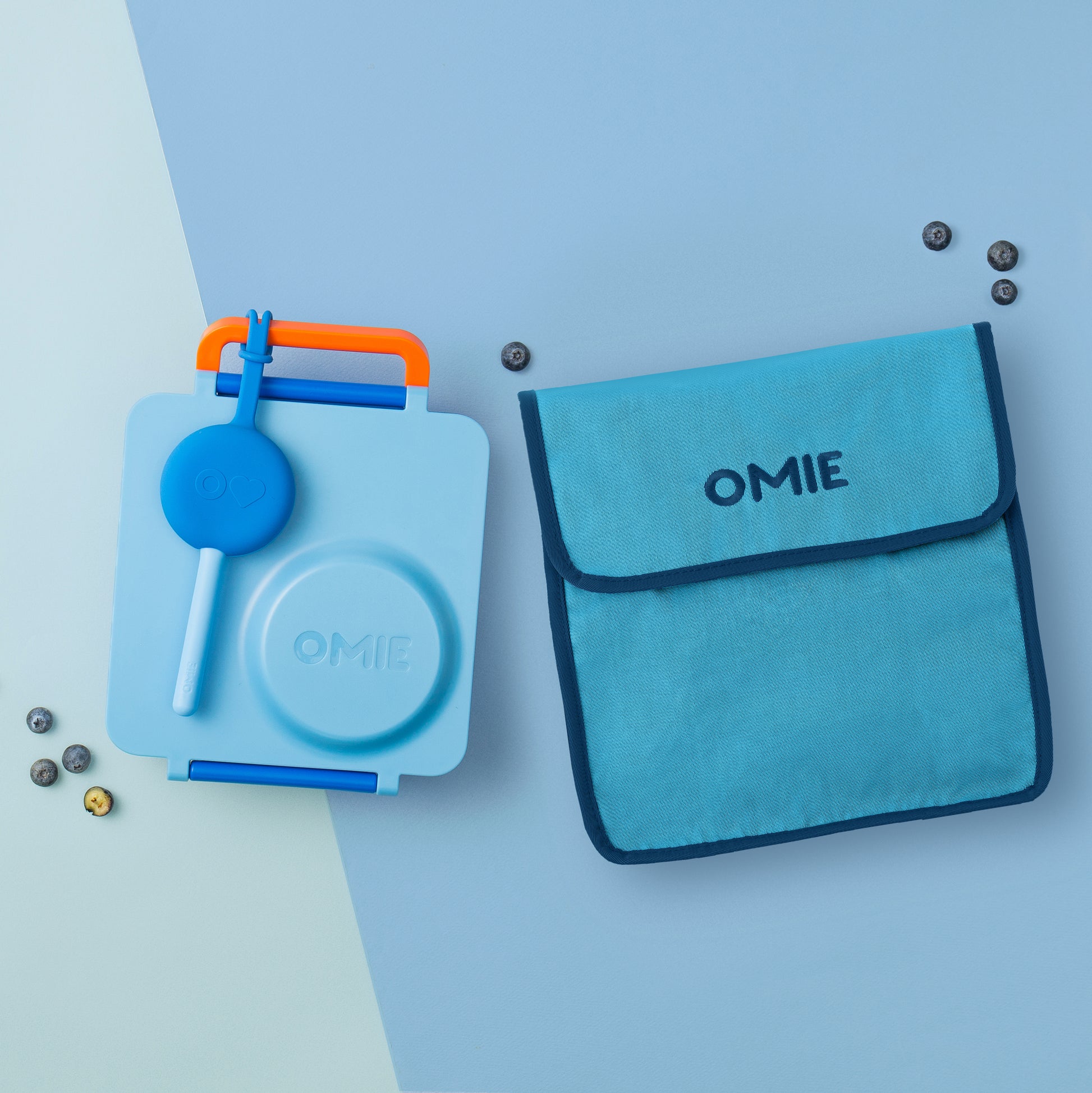 Blue OMIE product set on a light blue background