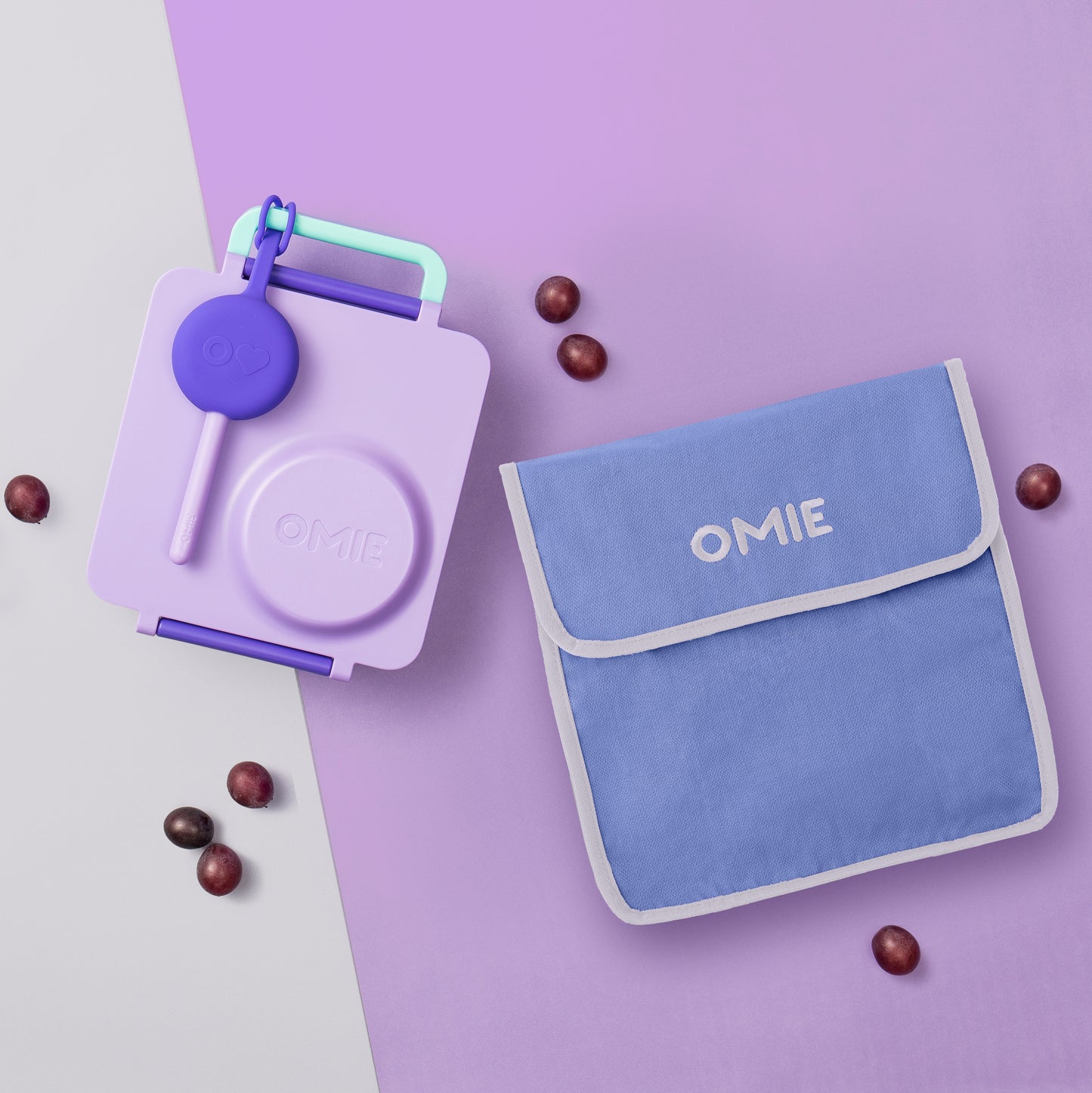 Purple and blue OMIE product with a bag on a purple background