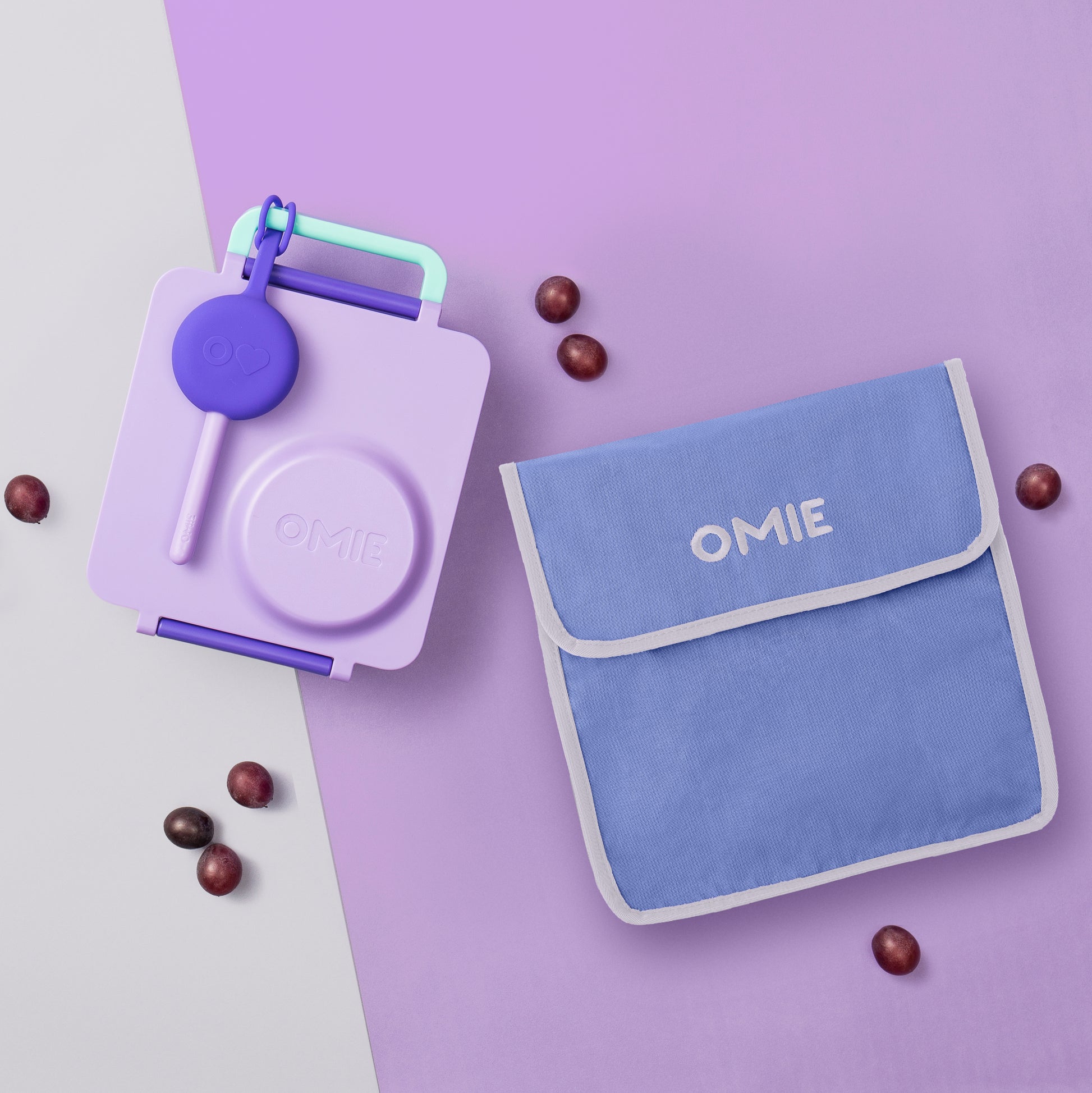 Purple and blue OMIE product with a bag on a purple background
